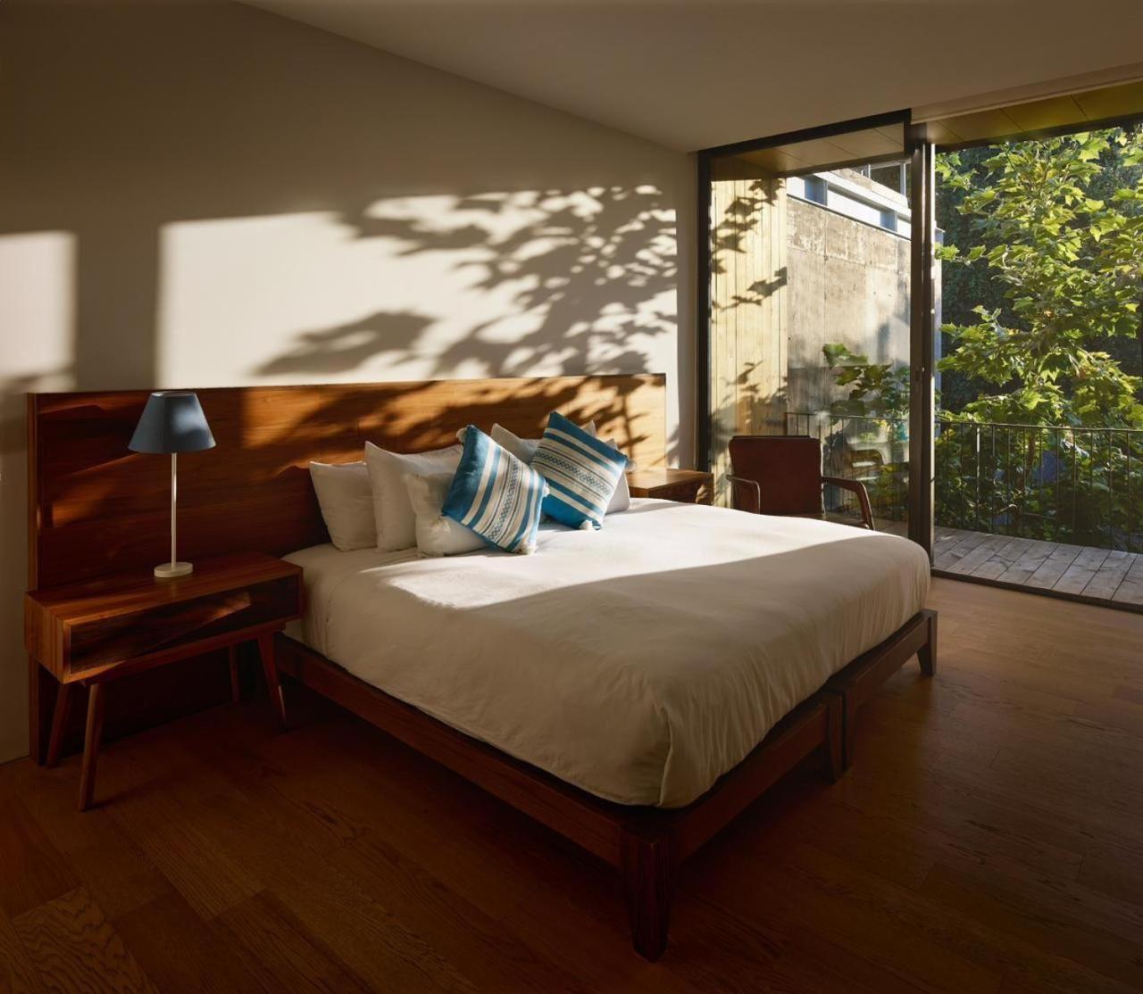 Hotel Cuatro Cuatros เอนเซนาดา ภายนอก รูปภาพ